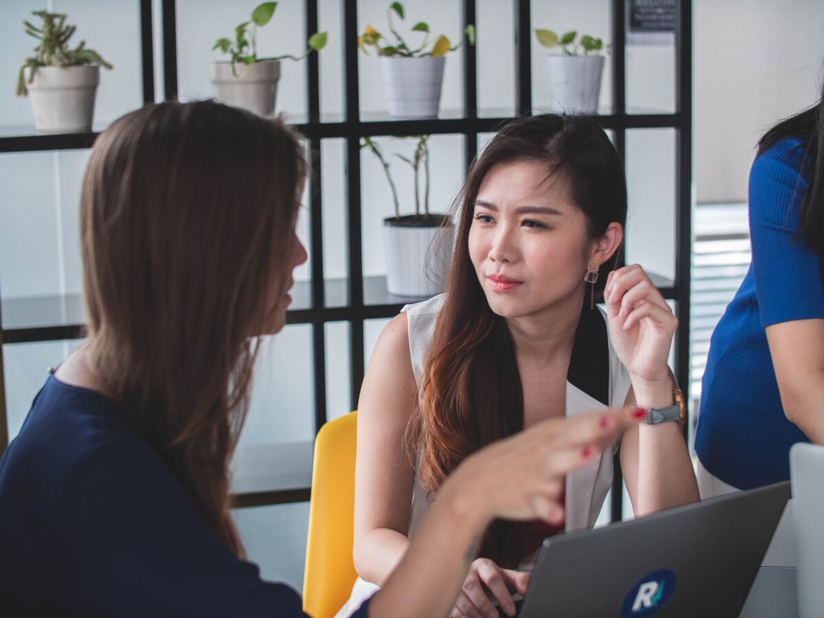 Productive and positive work culture concept image by Mimi Thian from Unsplash.